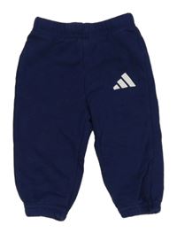 Tmavomodré tepláky s logem Adidas