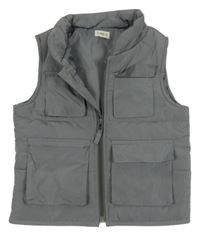 Sivá šušťáková zateplená vesta s vreckami F&F