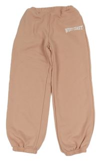 Svetloružové teplákové tepláky s nápisom SHEIN