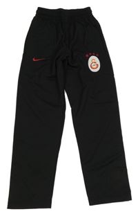 Čierne športové tepláky s logem Nike