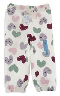 Nové - Smetanové tepláky se srdíčky Primark