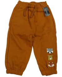 Nové - Rezavé tepláky se zvířaty Dunnes