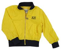 Žltá šušťáková jarná bunda s nápisom