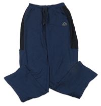 Tmavomodré melírované sportovní tepláky se síťovinou Yigga