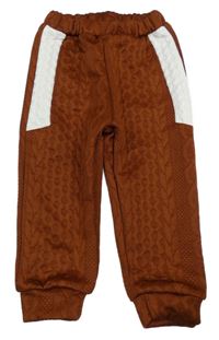 Hnedo-biele vzorované tepláky