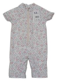 Nové - Bílý květovaný UV overal Mothercare