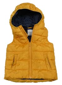 Okrová šusťáková prošívaná zateplená vesta s kapucí sinsay