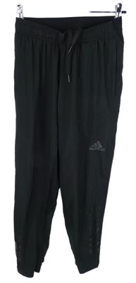Dámske čierne šušťákové funkčné nohavice s logom Adidas