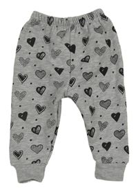 Šedé melírované puntíkaté tepláky se srdíčky