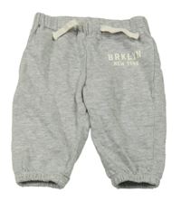 Svetlosivé tepláky s nápisom H&M