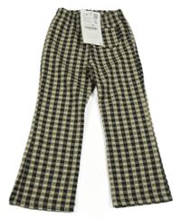 Nové - Čierno-béžové kockované nohavice Zara