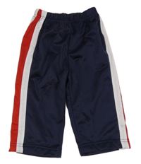 Tmavomodro-červené športové tepláky s bielymi pruhmi