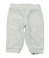 Bielo-svetlomodré pruhované zamatové tepláky Benetton