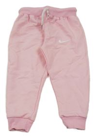 Svetloružové tepláky s logem - Nike