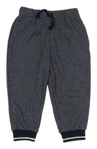 Tmavomodré-biele vzorované tepláky