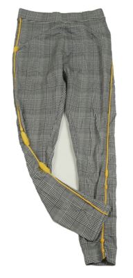 Čierno-biele kockované legíny s pruhom H&M