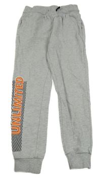 Šedé melírované tepláky s nápisem Destination