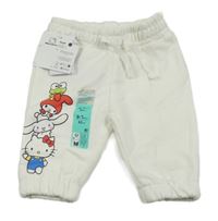 Nové - Smetanové tepláky s Hello Kitty Primark