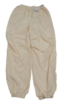 Nové - Světlerůžové šusťákové podšité kalhoty Primark