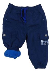 Tmavomodré šušťákové zateplené nohavice s vreckom Ergee