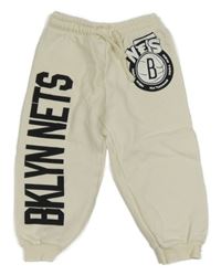 Smetanové tepláky s nápisem Zara