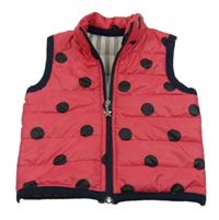 Tmavorůžovo-čierna bodkovaná á prešívaná šušťáková zateplená vesta