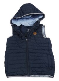 Tmavomodrá šusťáková prošívaná zateplená vesta s kapucí Topolino