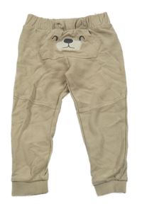 Béžové tepláky s čumákem C&A