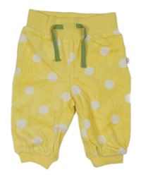 Žlto-biele bodkovaná é zamatové tepláky Liegelind