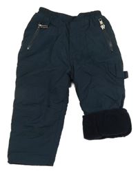 Tmavomodré šusťákové zateplené kalhoty 