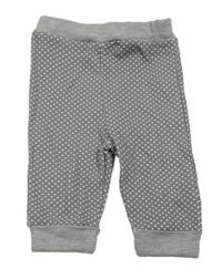 Šedé tepláky s puntíky