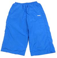 Tmavomodré šusťákové kraťasy s logem Slazenger