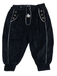 Tmavomodré sametové tepláky s výšivkou 