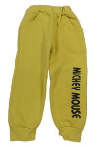 Okrové tepláky s nápisom