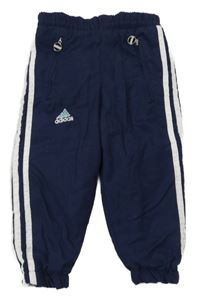 Tmavomodré šusťákové kalhoty s pruhy a logem Adidas