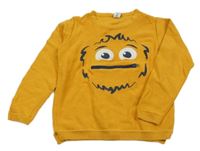 Okrový ľahký sveter s príšerkou Dopodopo