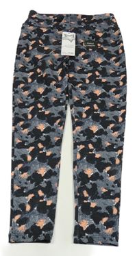 Nové - šedo-černo-oranžové vzorované legíny dunnes