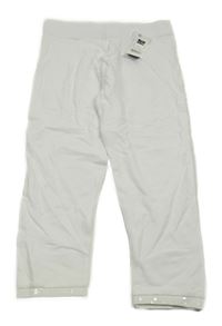 Nové - Biele crop legíny s flitrami Dunnes Sores