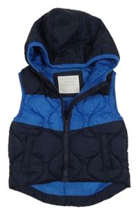 Tmavomodro-modrá prešívaná šušťáková zateplená vesta s kapucňou Primark