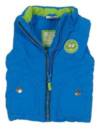 Modrá šušťáková zateplená vesta s nášivkou Topomini
