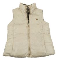 Béžová šusťáková zateplená oboustranná vesta se srdíčkem 