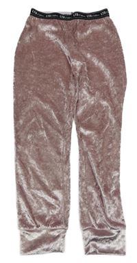 Svetloružové zamatové tepláky s nápisy v pase Matalan