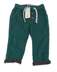 Nové - Tmavozelené menšestrové podšité nohavice Lupilu