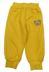 Žluté tepláky s medvídkem 
