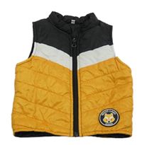 Čierno-bielo-žltá šušťáková zateplená vesta
