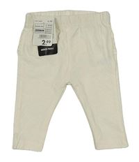 Nové - Smotanové legíny s volánikmi