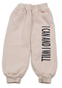 Ružové tepláky s nápisom