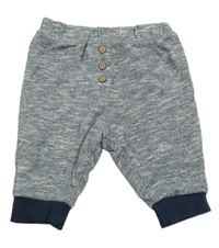 Tmavomodré melírované podšité tepláky s knoflíky Impidimpi