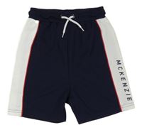 Tmavomodro-biele športové kraťasy s logom McKenzie