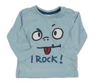 Světlemodré triko s očima a nápisem Dopodopo